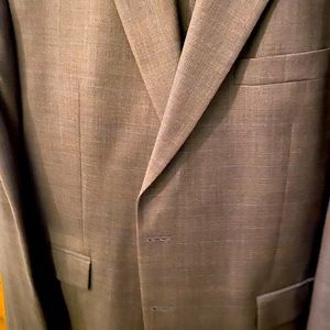 Executive All Wool Ralph Lauren Top of their line. Dark Brown .Sharp suit. 48R